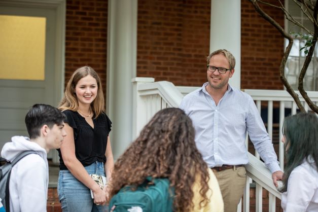 Professor and Students on Croft Porch